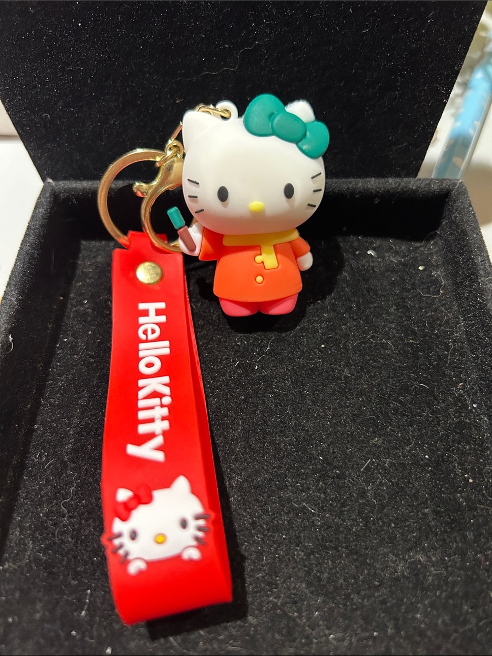 Hello Kitty Red Strap Keychain with Green Bow Charm